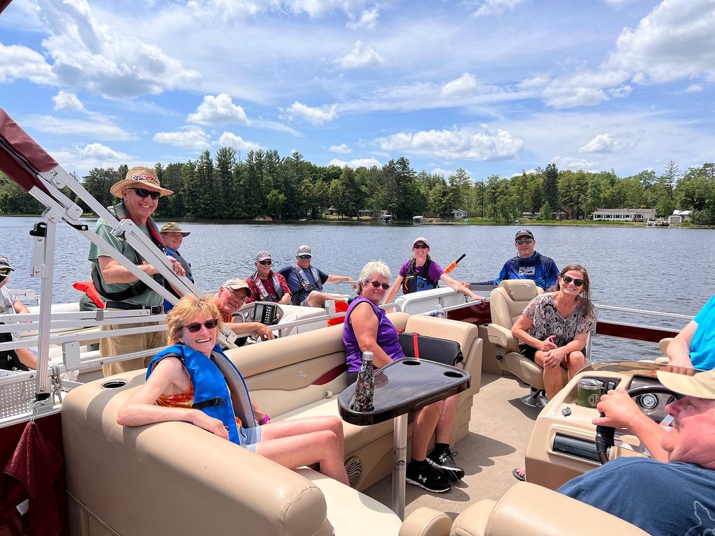 Group aboard a pontoon boat