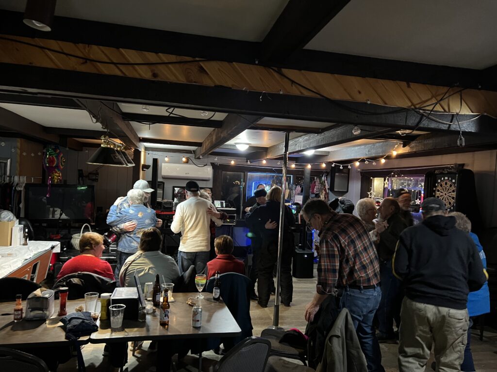 People inside PB&Js Bar, enjoying PLA's WinterFest